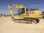 Side of Used Excavator in yard
